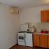 Apartmani Minna, Частный сектор жилья Добре Воде, Черногория - Kuhinja Apartman 2