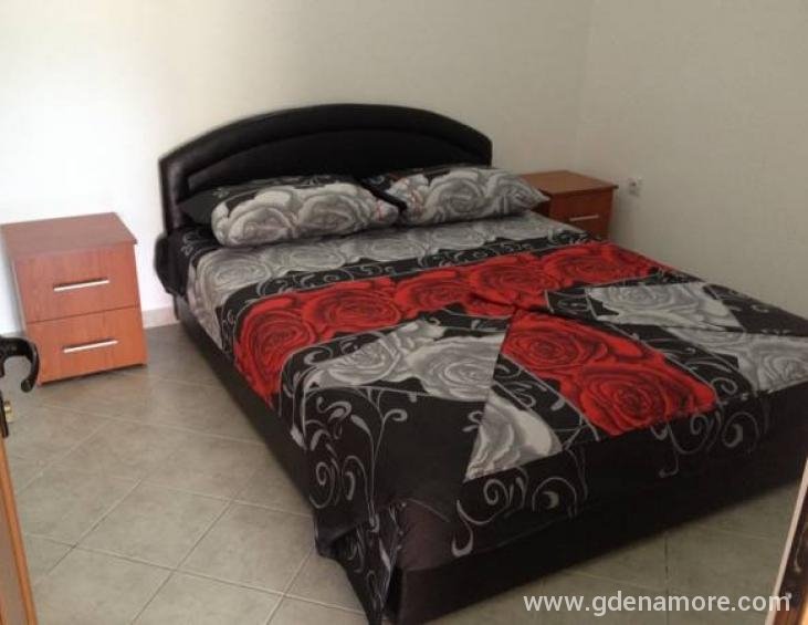 Spavaca soba u apartmanu u suterenu kuce